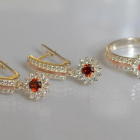 Срібний набір з золотими пластинами