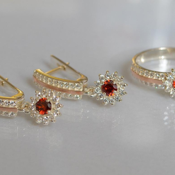 Срібний набір з золотими пластинами