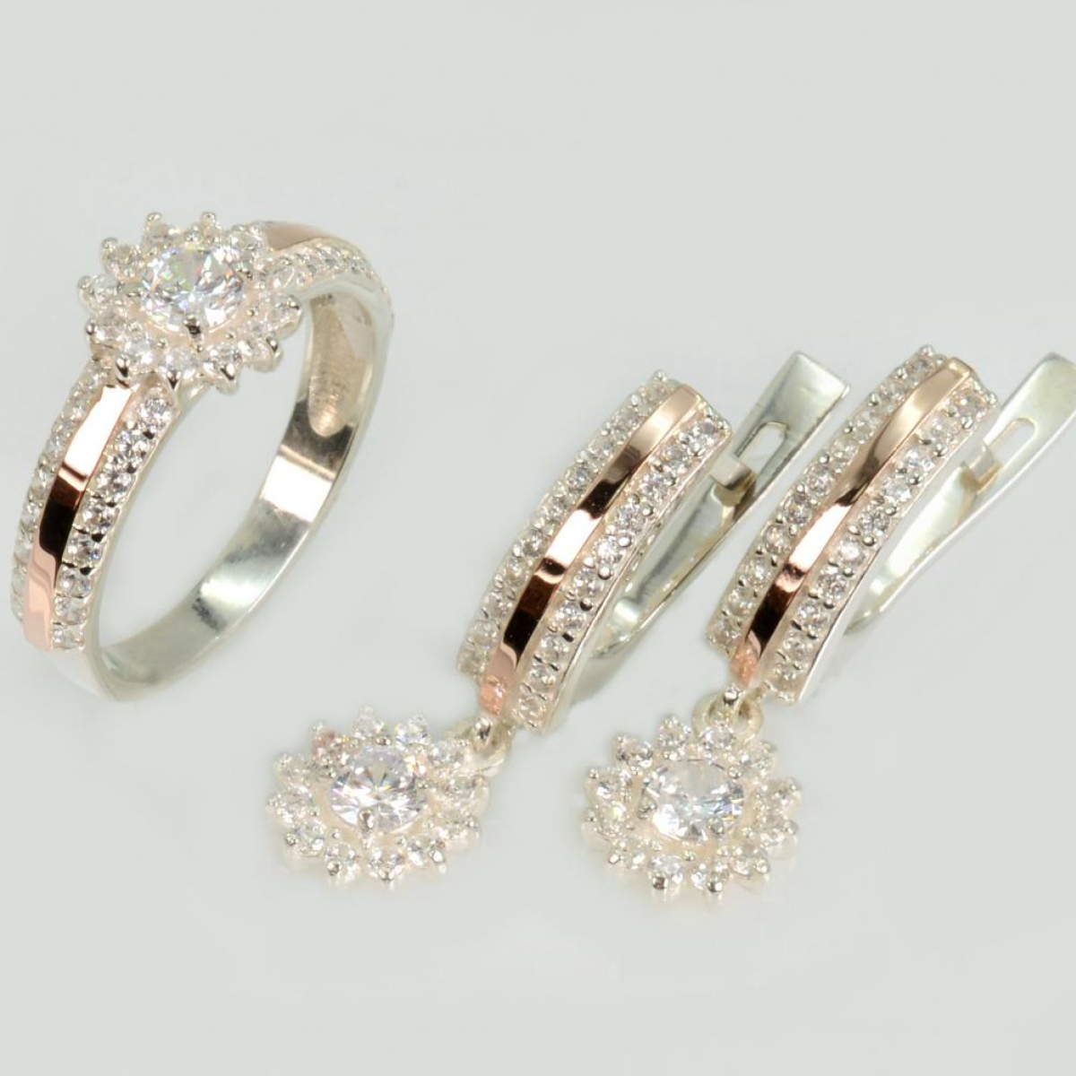 Срібний набір з золотими пластинами