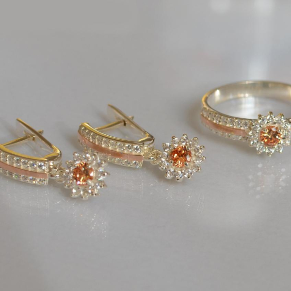 Срібний набір з золотими пластинами