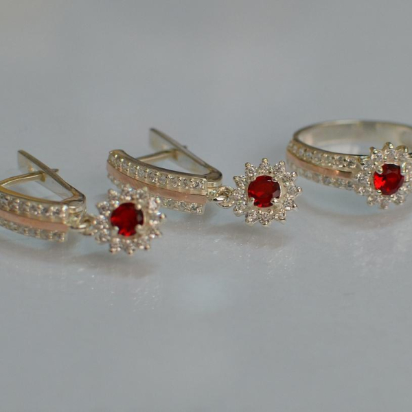 Срібний набір з золотими пластинами