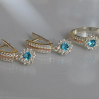 Срібний набір з золотими пластинами