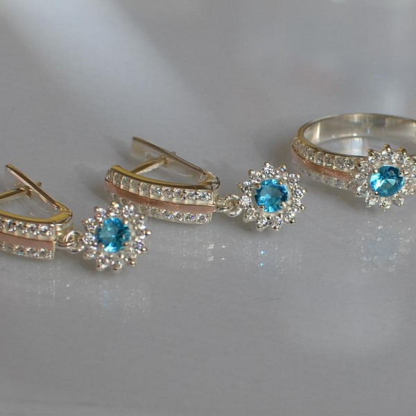 Срібний набір з золотими пластинами