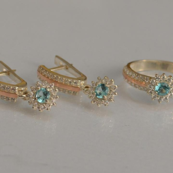 Срібний набір з золотими пластинами