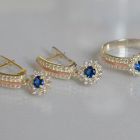 Срібний набір з золотими пластинами