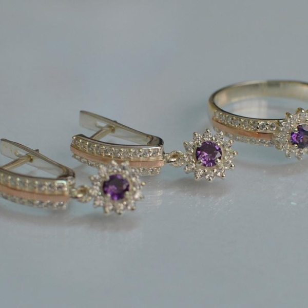 Срібний набір з золотими пластинами