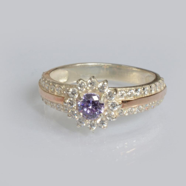 Серебряное кольцо с золотыми вставками