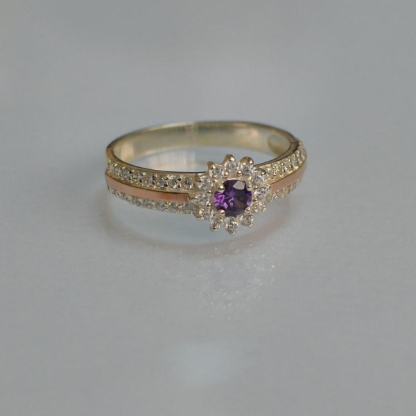 Серебряное кольцо с золотыми вставками