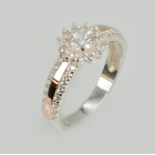 Серебряное кольцо с золотыми вставками