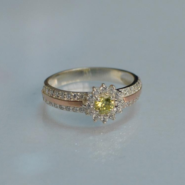 Серебряное кольцо с золотыми вставками