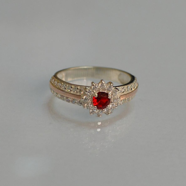 Серебряное кольцо с золотыми вставками