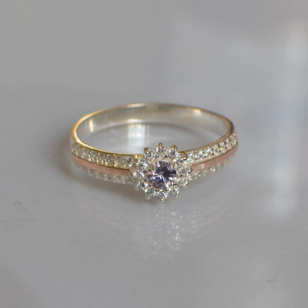 Серебряное кольцо с золотыми вставками