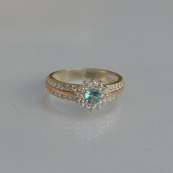 Серебряное кольцо с золотыми вставками