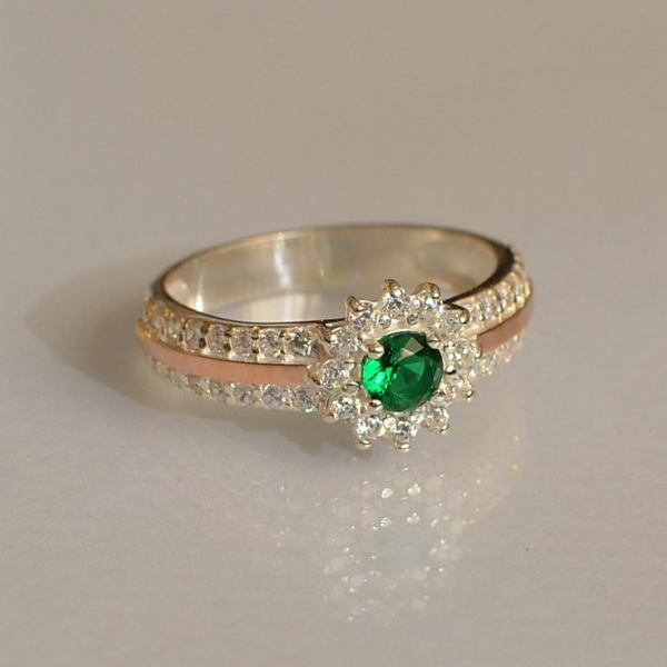 Серебряное кольцо с золотыми вставками