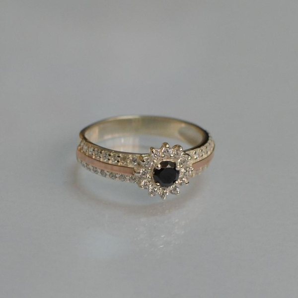 Серебряное кольцо с золотыми вставками