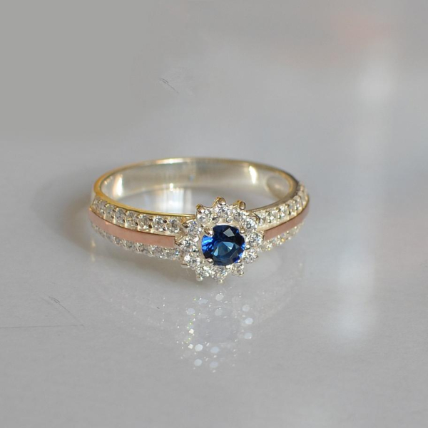 Серебряное кольцо с золотыми вставками