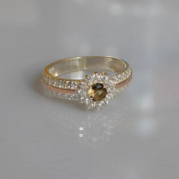 Серебряное кольцо с золотыми вставками