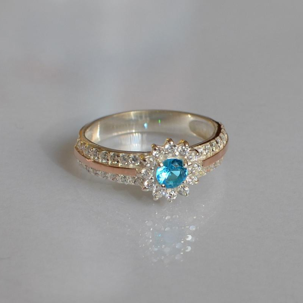 Серебряное кольцо с золотыми вставками