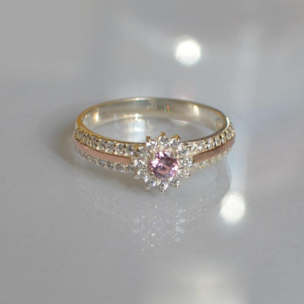 Серебряное кольцо с золотыми вставками