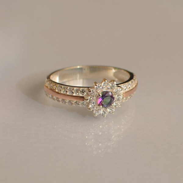 Серебряное кольцо с золотыми вставками