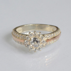 Серебряное кольцо с золотыми вставками