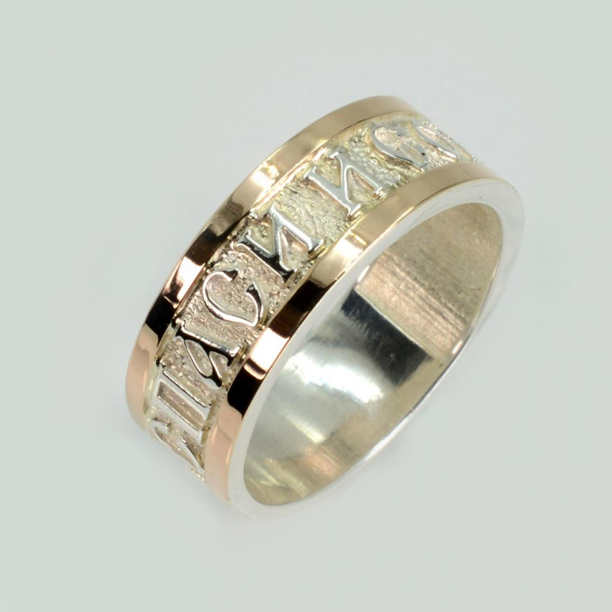 Срібна каблучка з золотими вставками