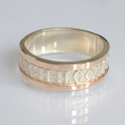Срібна каблучка з золотими вставками