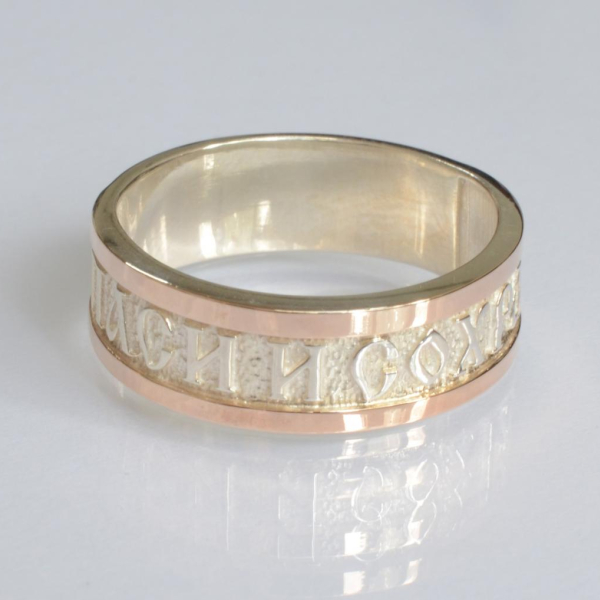 Срібна каблучка з золотими вставками