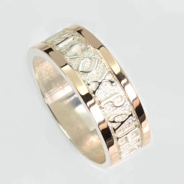 Срібна каблучка з золотими вставками