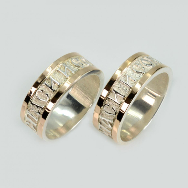 Срібна каблучка з золотими вставками