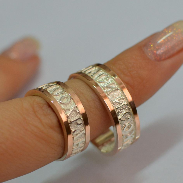 Пара срібних обручок з золотом