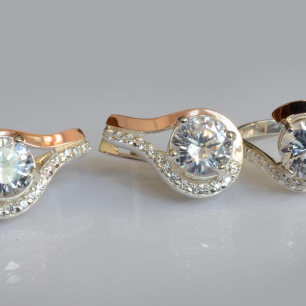 Срібний набір з золотими пластинами