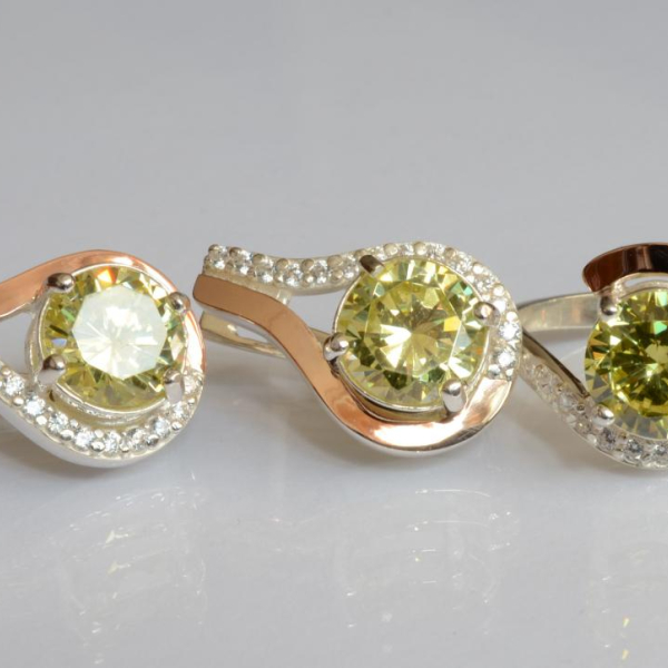 Срібний набір з золотими пластинами