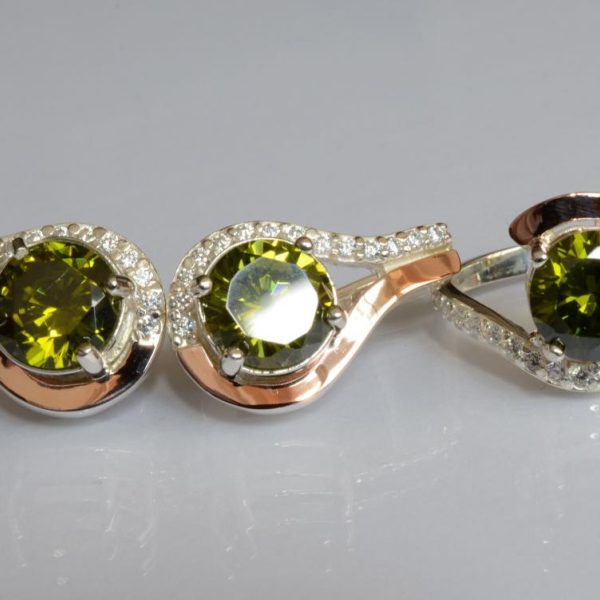 Срібний набір з золотими пластинами