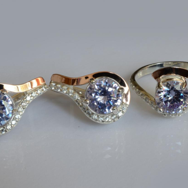 Срібний набір з золотими пластинами