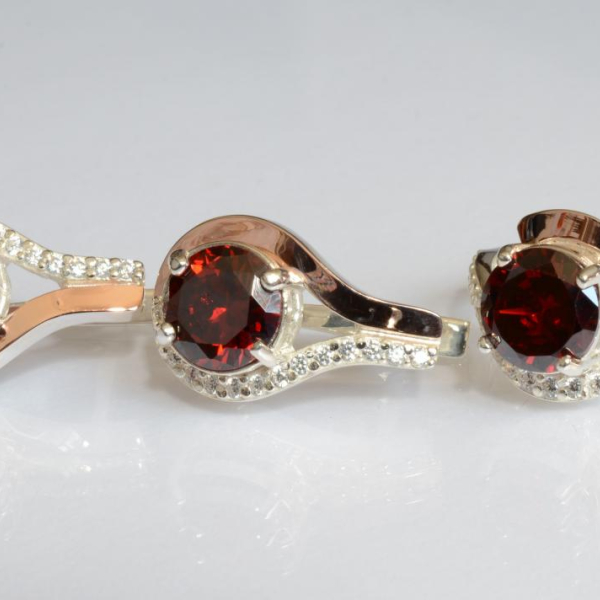 Срібний набір з золотими пластинами