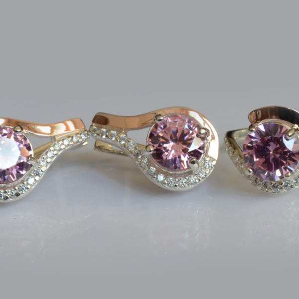 Срібний набір з золотими пластинами