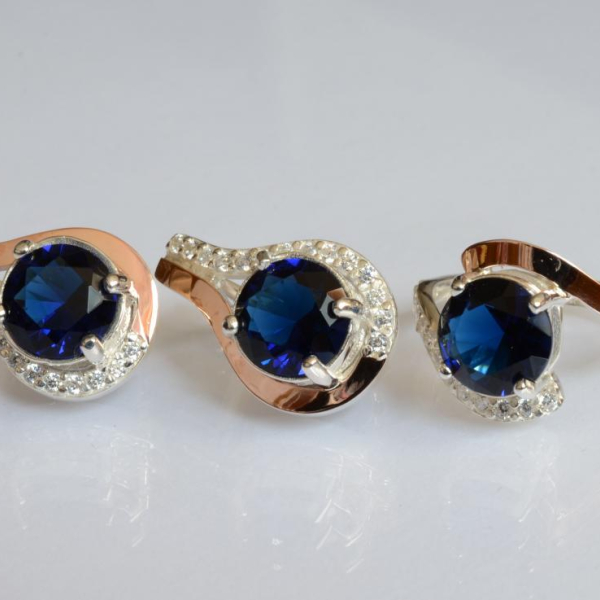 Срібний набір з золотими пластинами