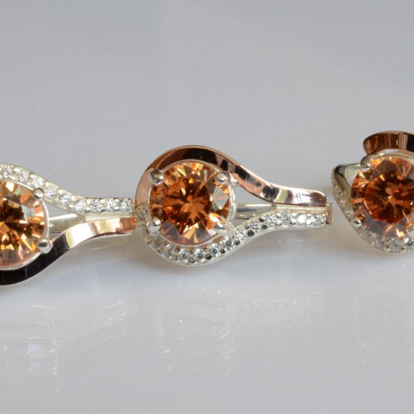 Срібний набір з золотими пластинами