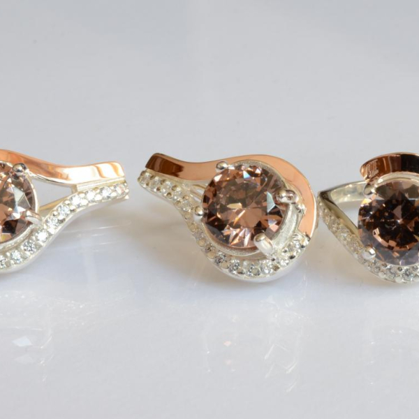 Срібний набір з золотими пластинами