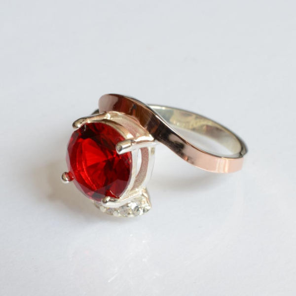 Срібна каблучка з золотими вставками