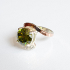 Срібна каблучка з золотими вставками