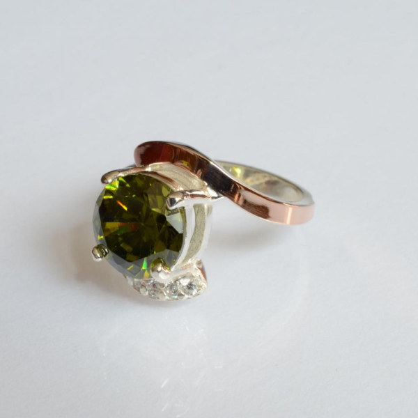 Срібна каблучка з золотими вставками