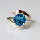 Срібна каблучка з золотими вставками