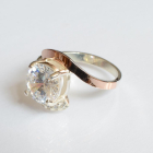 Срібна каблучка з золотими вставками