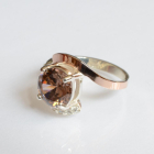 Срібна каблучка з золотими вставками