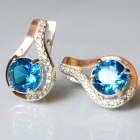 Срібні сережки з золотими пластинами