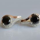 Срібні сережки з золотими пластинами