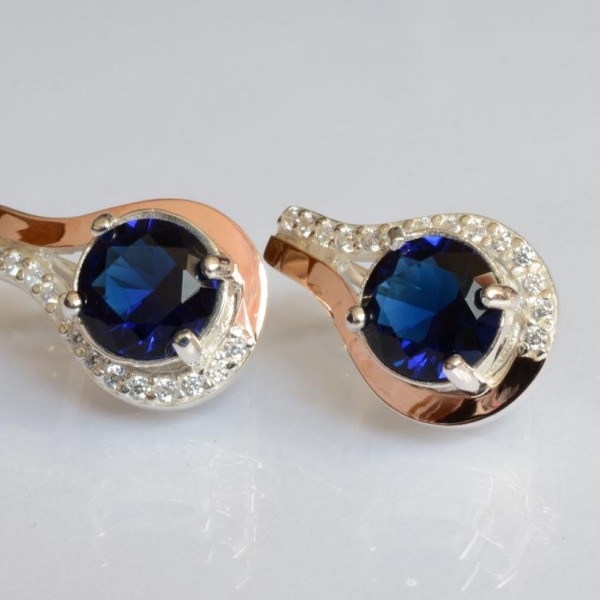 Срібні сережки з золотими пластинами