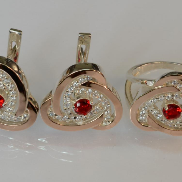 Срібний набір з золотими пластинами